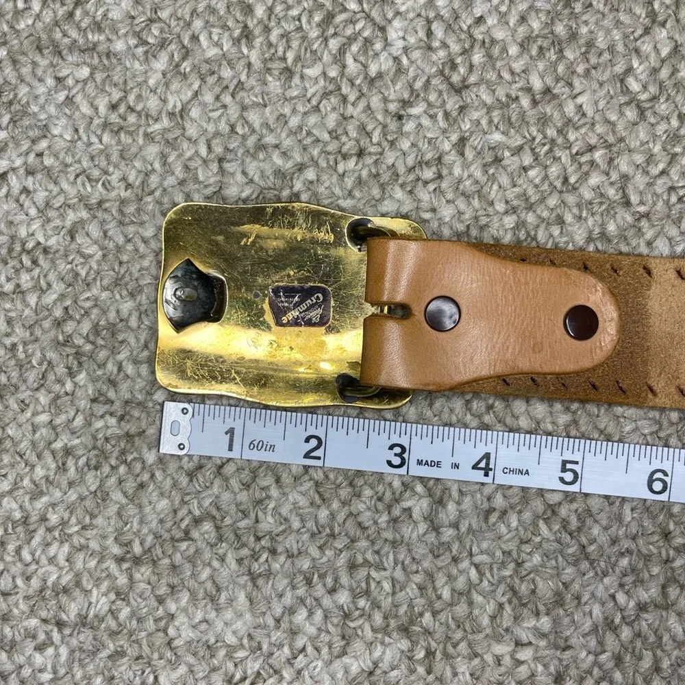 Cowboy belt buckle and leather belt